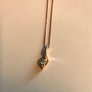 Rose gold necklace with diamond charm